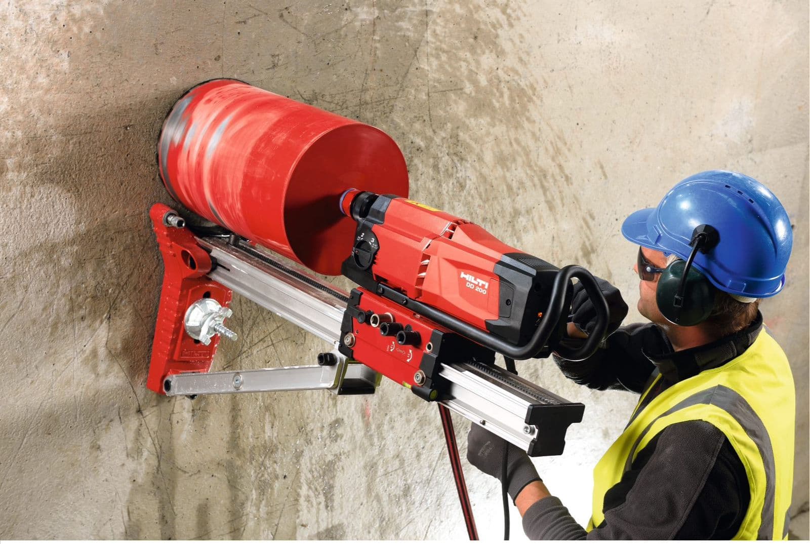 Core cutting machine drilling into concrete — core cutting Kerala